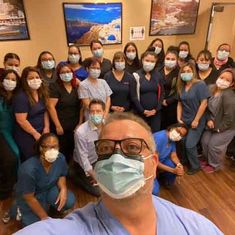 doctor with mask taking selfie